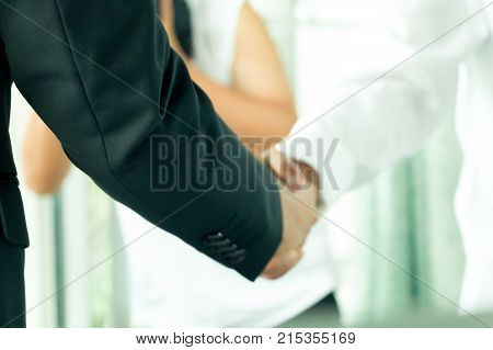 Businessmen Shake Hands And Finish Meeting In Daylight.