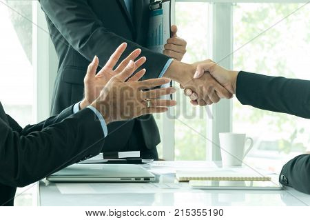 Businessmen Shake Hands And Finish Meeting In Daylight.