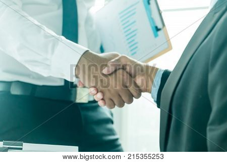 Businessmen Shake Hands And Finish Meeting In Daylight.