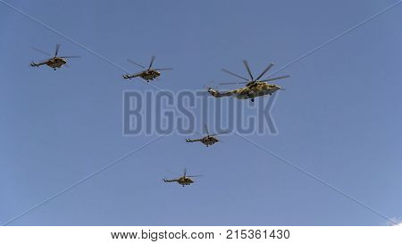 Combat Helicopters Mi-26 And Mi-8 Fly In Sky