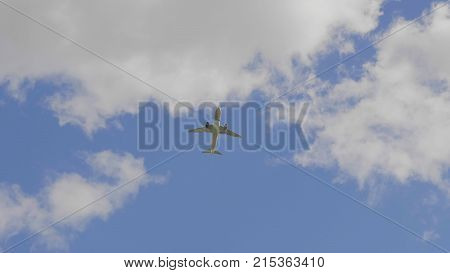 Commercial Passenger Airplane Flying Overhead On Sunny Day. Ultrahd Stock Footage