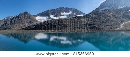 Mountains and peaks landscape. Stubaier Gletscher covered with glaciers and snow natural environment. Hiking in the Stubai Alps. Ski resort in Tirol Austria Europe