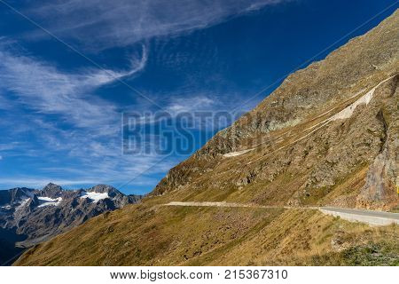 Mountains peaks and trees landscape natural environment. Timmelsjoch High Alpine Road. Passo del Rombo the highest pass of the Eastern Alps. Ötztal valley Tyrol Austria Europe