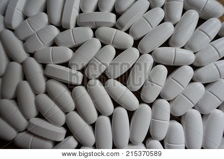 Big white tablets of calcium citrate from above