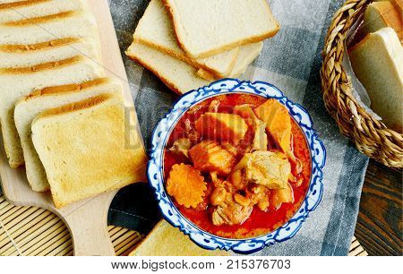 close up from Massaman Curry with toast  (Thai name is Gaeng Massaman)