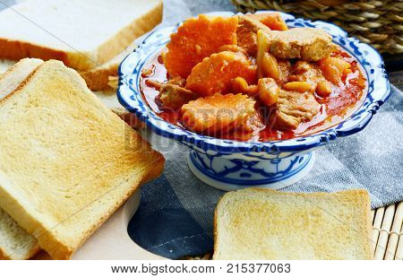 close up from Massaman Curry with toast  (Thai name is Gaeng Massaman)