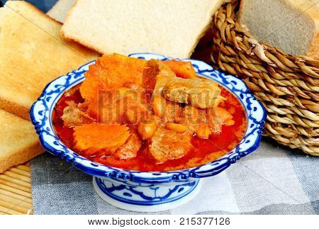 close up from Massaman Curry with toast  (Thai name is Gaeng Massaman)