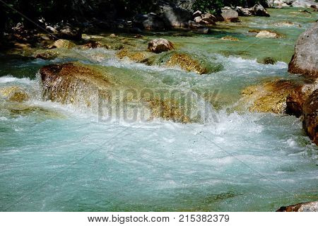 Close up of turquois Isonzo river near Trenta Slovenia