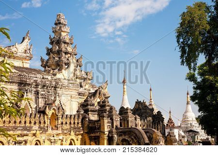 The brick yellow Maha Aung Mye Bon Zan monastery on the Inwa royal site near Mandalay