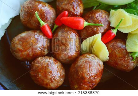 Easten thai sausage (Thai name is Sai Krok Isan) cooked with fresh vegetable