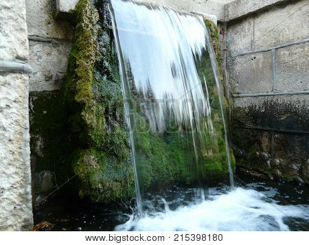 Waterfalls in the mountains of the North Caucasus surrounded by beautiful autumn nature