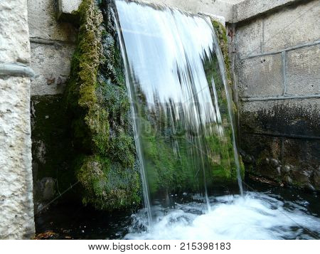 Waterfalls in the mountains of the North Caucasus surrounded by beautiful autumn nature