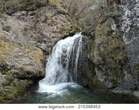 Waterfalls in the mountains of the North Caucasus surrounded by beautiful autumn nature