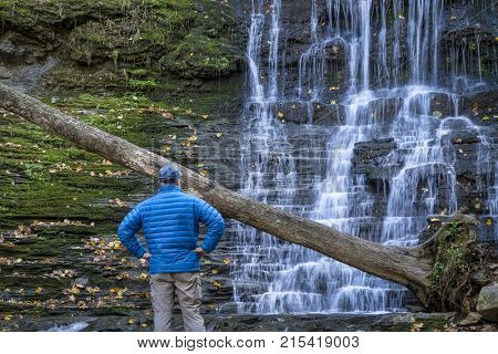 a male visitor at Jackson Falls at Natchez Trace Parkway, fall scenery