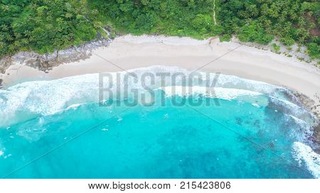 Sea aerial viewTop viewamazing nature background.The color of the water and beautifully bright.Azure beach with rocky mountains and clear water of Thailand ocean at sunny day.