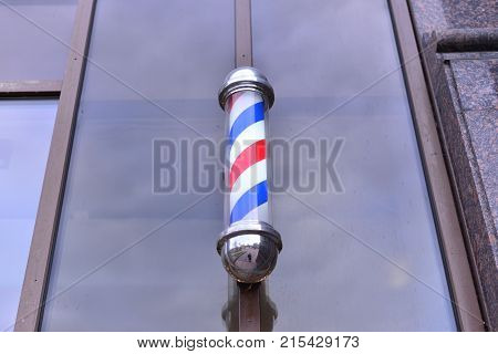 Barber Shop Pole. Symbol of a barbershop Lamp