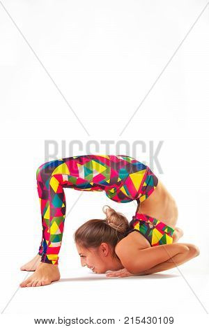 beautiful flexible woman doing yoga poses on white background