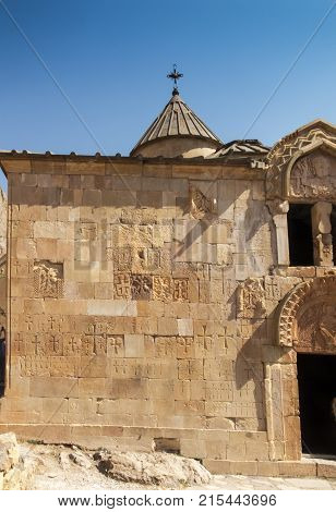 Crosses and other marks scratched on the walls of buildings in the Noravank monastery in Armenia