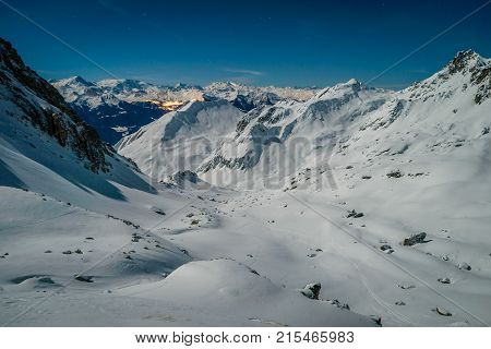 View from Presset refuge at night when there is snow in the mountains
