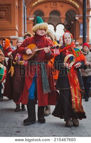 Russia. Moscow.Red square 26 Feb 2017. Carnival Maslenica . participants of the carnival are on the red square playing Russian folk musical instruments