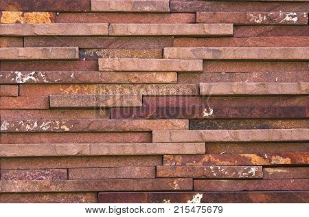 Stone wall texture, travertine tiles facing stone background