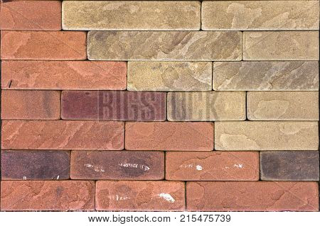 Stone wall texture, travertine tiles facing stone background