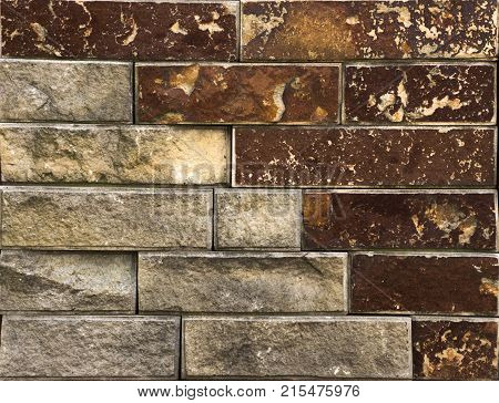 Stone wall texture, travertine tiles facing stone background