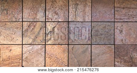 Stone wall texture, travertine tiles facing stone background