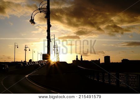 Evening traffic during sunset in the backlight on the Theodor Heuss Bridge in Mainz.