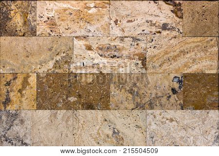 Facing tile from travertine with a smooth surface texture