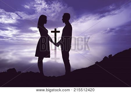 Portrait Of Romantic Couple Holding Hands And Looking At Each Other