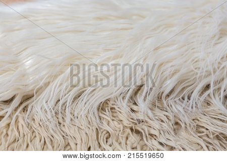 Artificial fur background white, brown, beige, cream