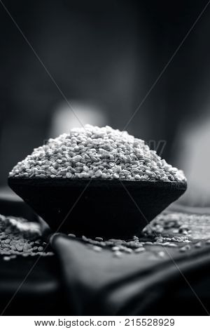 Vigna mungo, urad, Split Black gram, in a clay bowl.