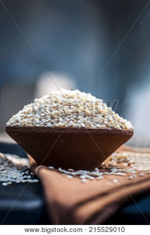 Vigna mungo, urad, Split Black gram, in a clay bowl.
