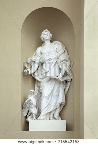 Niche sculpture of st John on St. Stanislaus and St Ladislaus cathedral in Vilnius, Lithuania