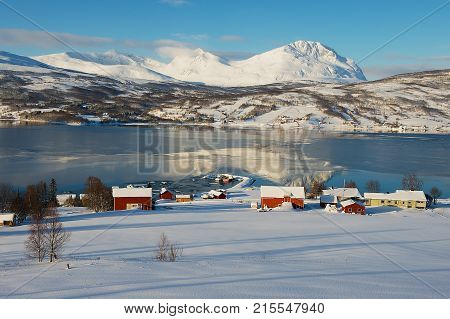 Winter view to Lavangen fjord and Soloy village Troms county, Norway.