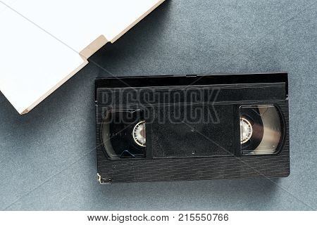 Blank used video casette tape retro technology. Video home system (VHS) recording tape with blank warapper as copy space.