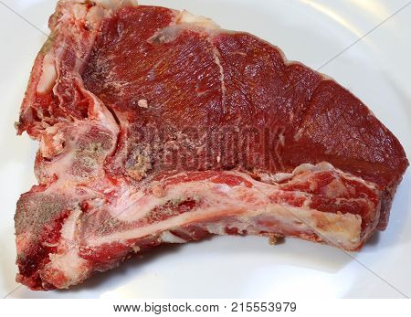 Raw Beef Steak In Ceramic Dish