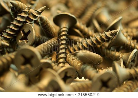 self tapping metal screw with hex head on a white background