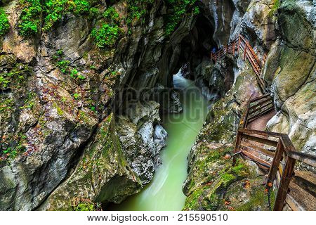 Wooden walkway and wooden bridge on Lammer river, Canyon Lammerklamm, Salzkammergut, Austria, Europe