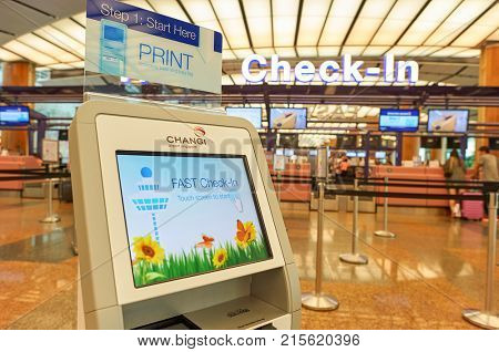 SINGAPORE - NOVEMBER 09, 2015: close up shot of self check-in kiosk at Singapore Changi Airport.