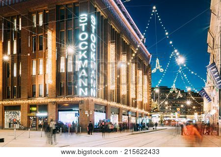 Helsinki, Finland - December 6, 2016: Building Of Stockmann Department Store On Aleksanterinkatu Street In Evening Or Night Christmas Xmas New Year Festive Illumination. It Is Finnish Company Of Retail Trade.