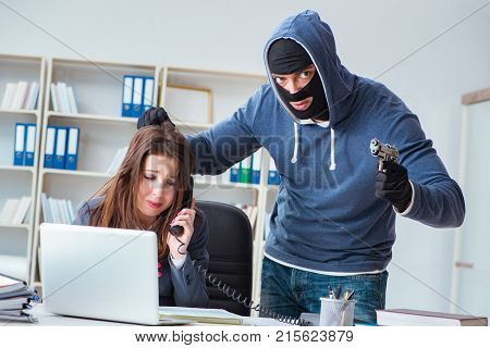 Criminal taking businesswoman as hostage in office