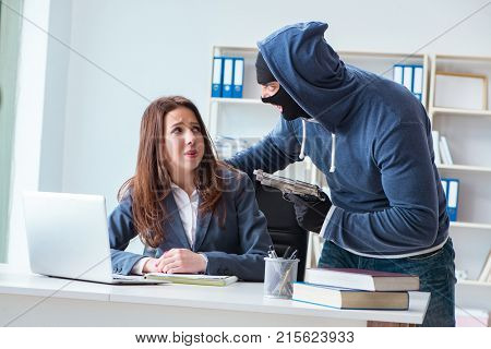Criminal taking businesswoman as hostage in office