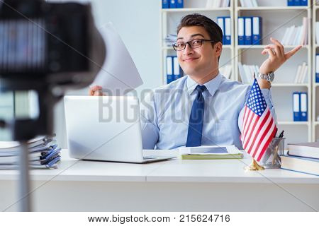 Videoblogger explaining green card visa application process