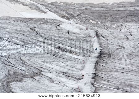 People Hiking On Dachstein Glacier Near Hunerkogel Station, Austrian Alps