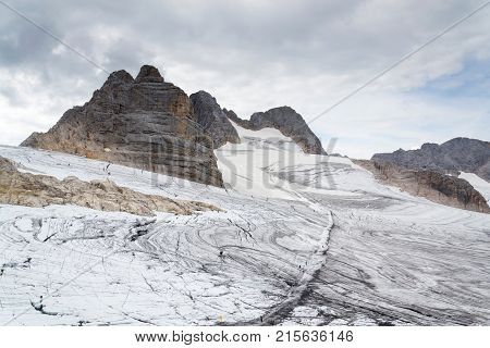 People Hiking On Dachstein Glacier Near Hunerkogel Station, Austrian Alps