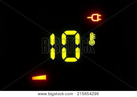 on a black electronic thermometer display -10 degrees Celsius