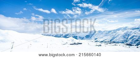 Panorama of snow mountains in winter. Gudauri, Georgia