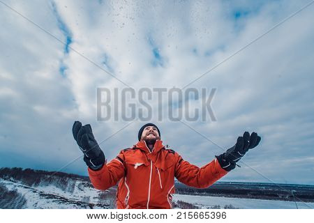 Snowboarder In A Black Helmet Riding On A Snowy Track.